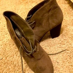 Clean barely used brownish green heels text me for a different price